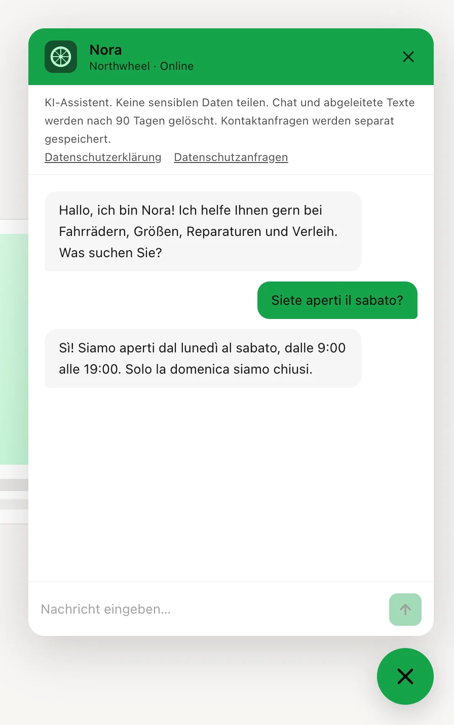 Deutsche Buttons und Hinweise, ein Besucher schreibt auf Italienisch, und die Antwort kommt auf Italienisch