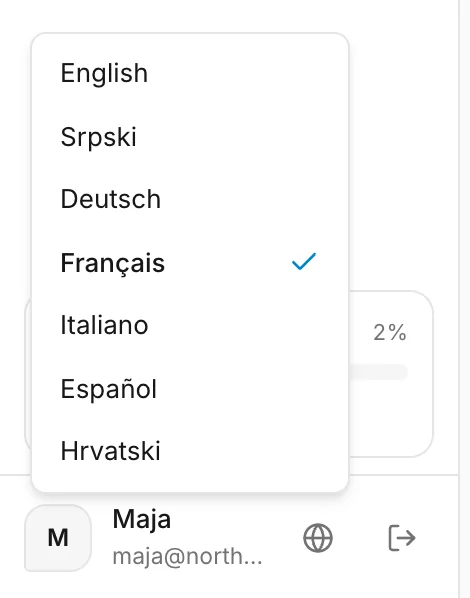Le menu des langues à côté de votre nom